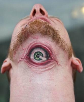 Oko tatuaż męski