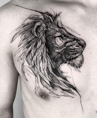 Tatuaż lew na klatce piersiowej