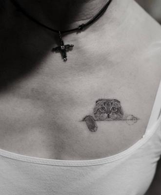 Tatuaże damskie kotek