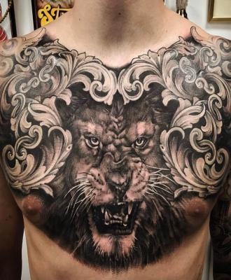 Tatuaże męskie na klatce piersiowej lew