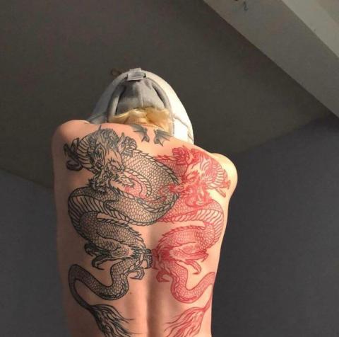 Dwa smoki tatuaż