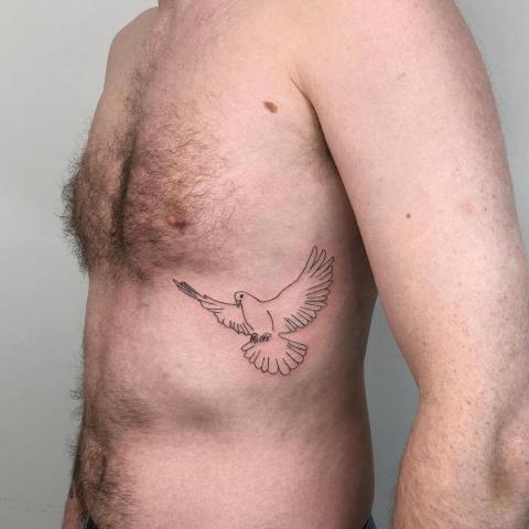 Tatuaż gołąb dla mężczyzny